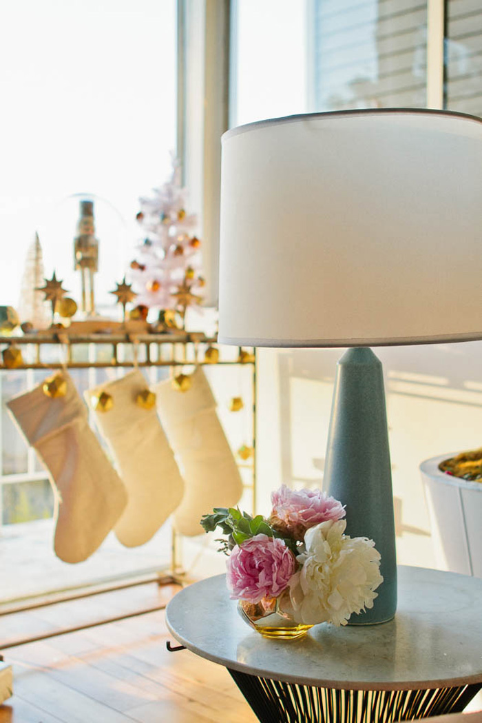 Emily Henderson Holiday Decorating Copper Gold Blue Entry Table Stockings