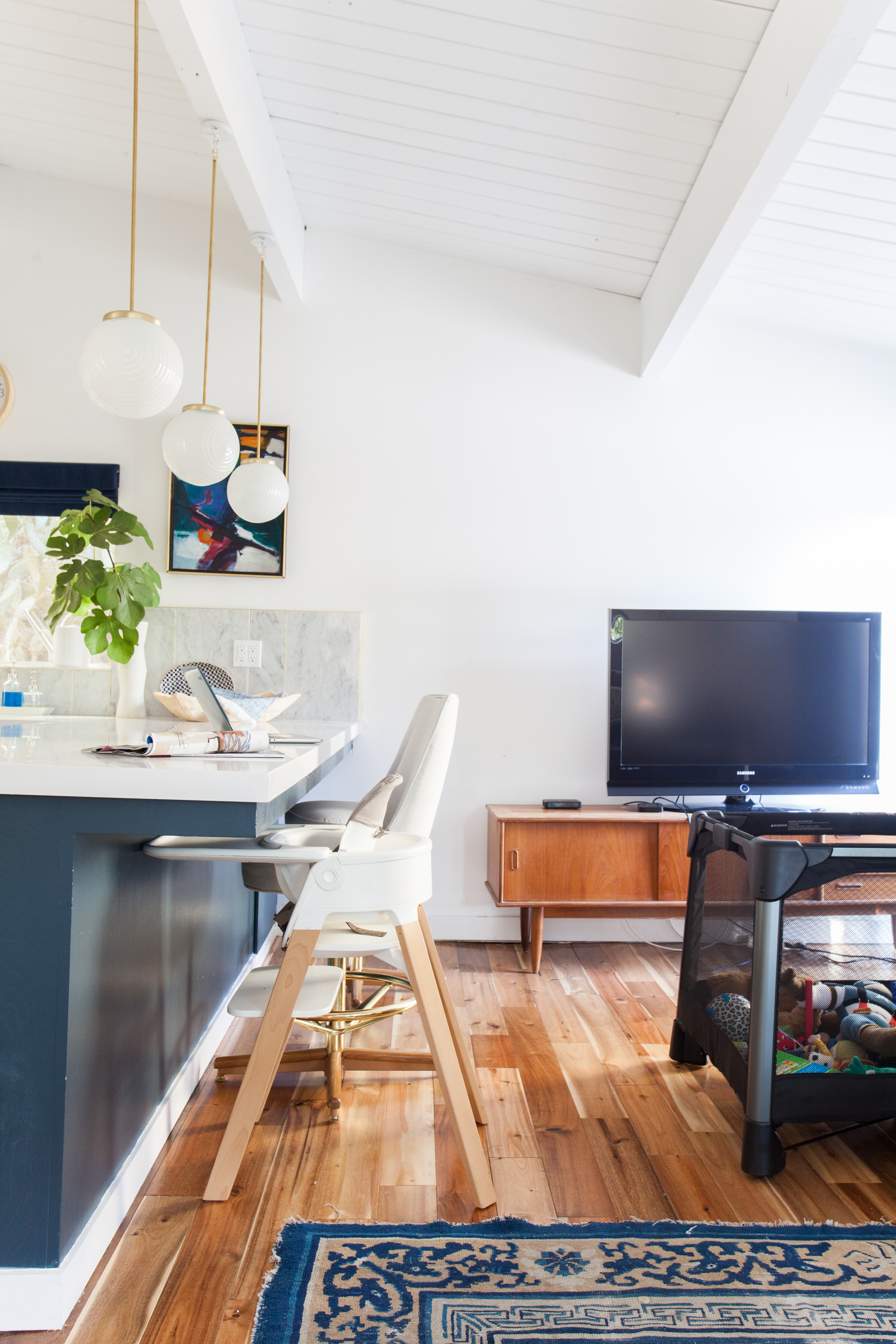 kitchen_after emily henderson blue white brass family room tv