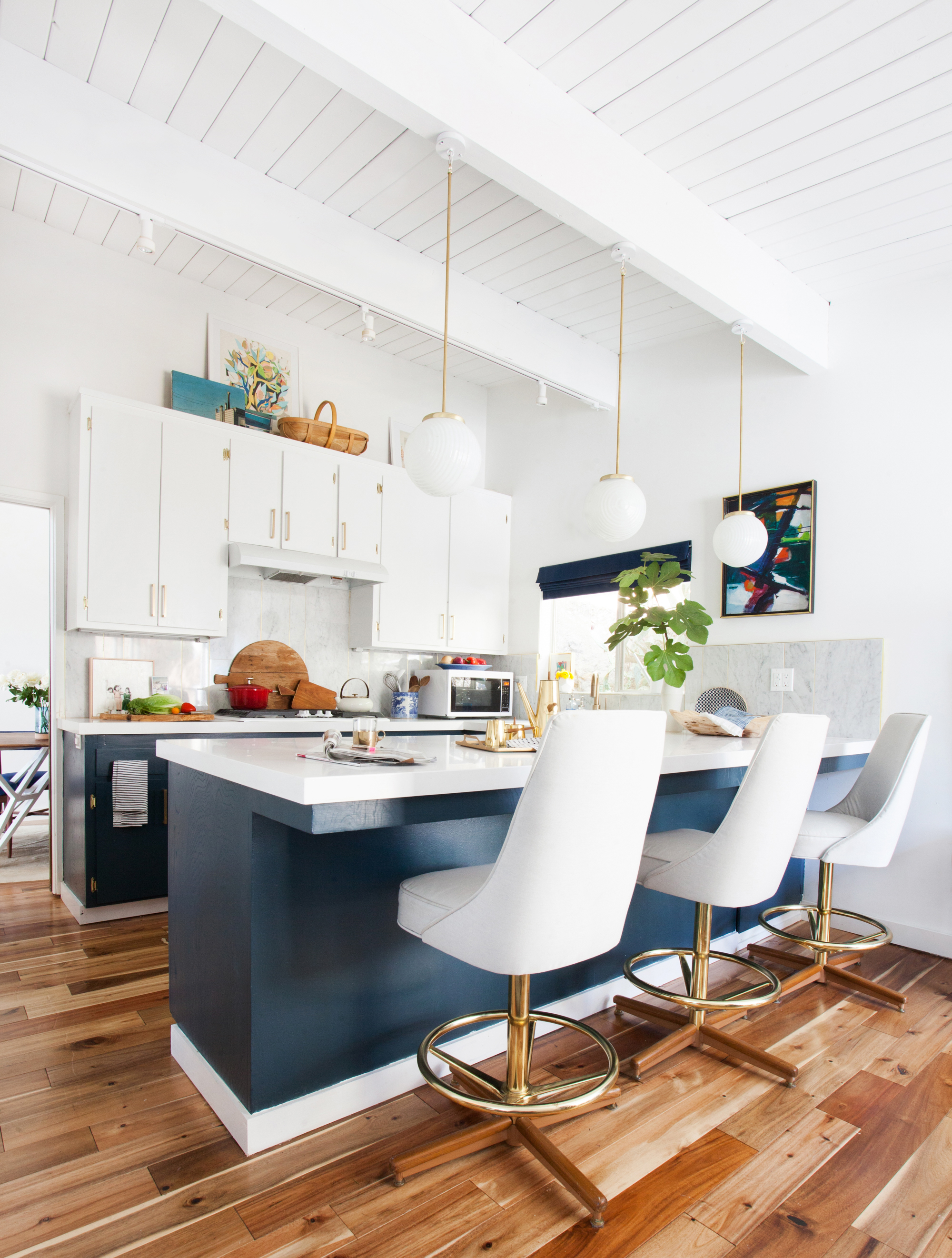 kitchen_after emily henderson blue white brass stools overall