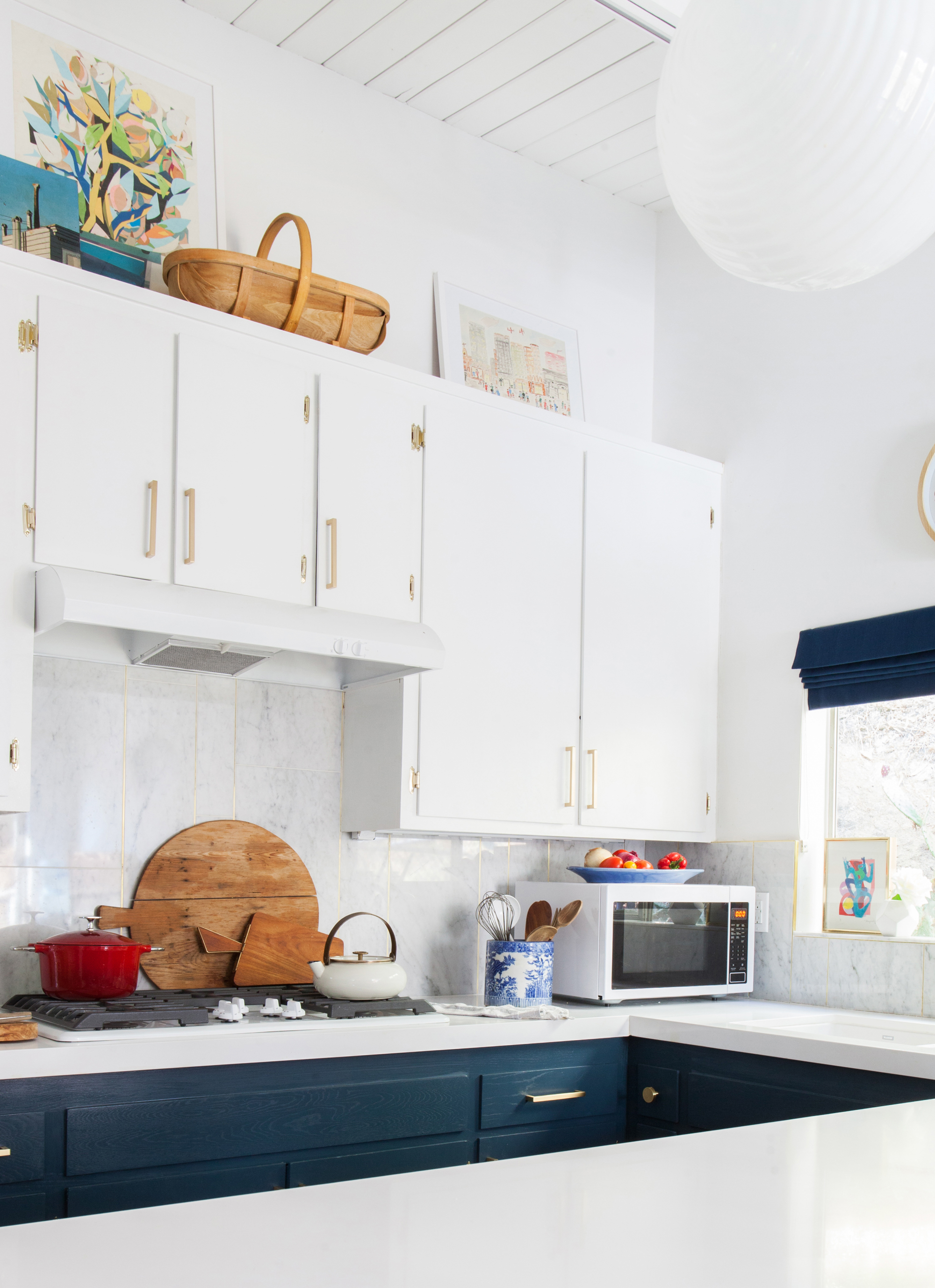 kitchen_after_emily henderson blue white brass countertops cabinets