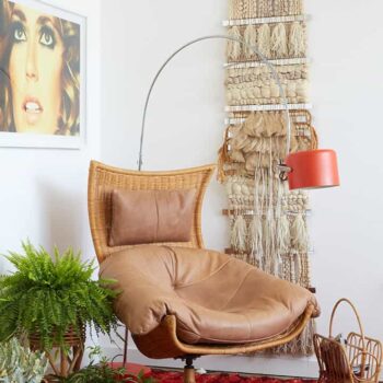 70s Gift Guide_Retro_Boho_Living Room_Wicker Chair_Shag Rug_Emily_Henderson