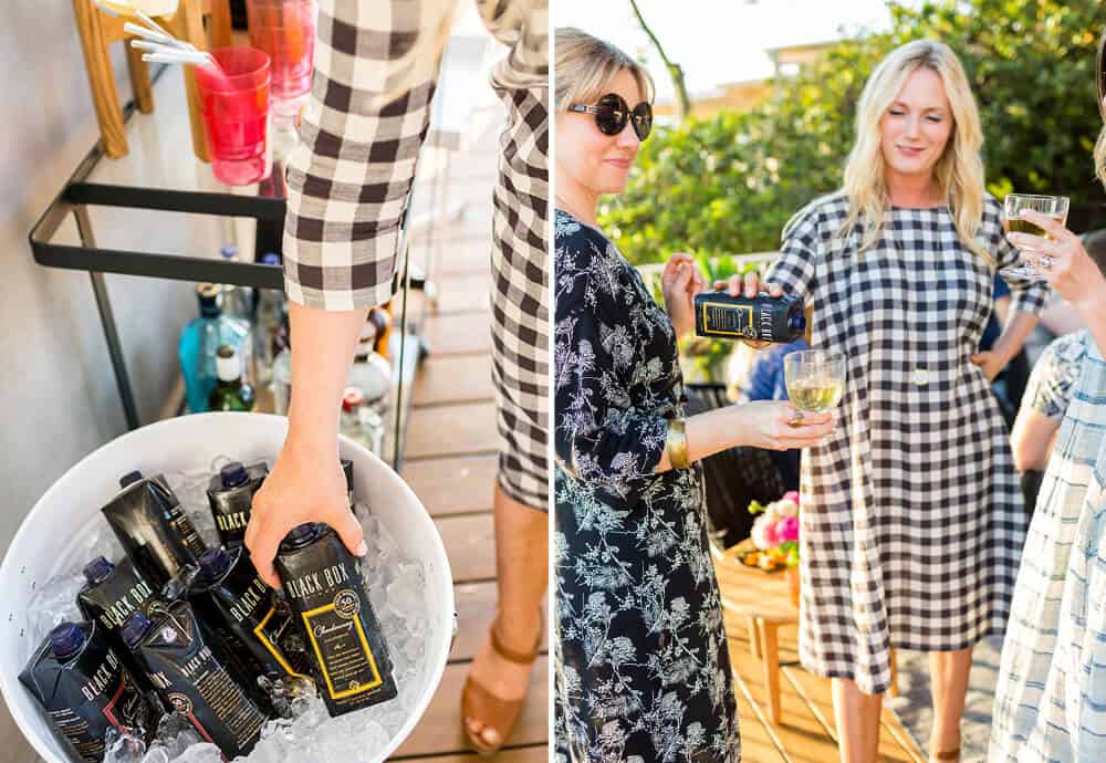 Summer Party_Outdoor Entertaining_Emily Henderson_Blackbox Wines_Flowers_Casual_Pink_Orange_Modern_Organic_Boho_Black_Grey_Blue_0_pouring wine