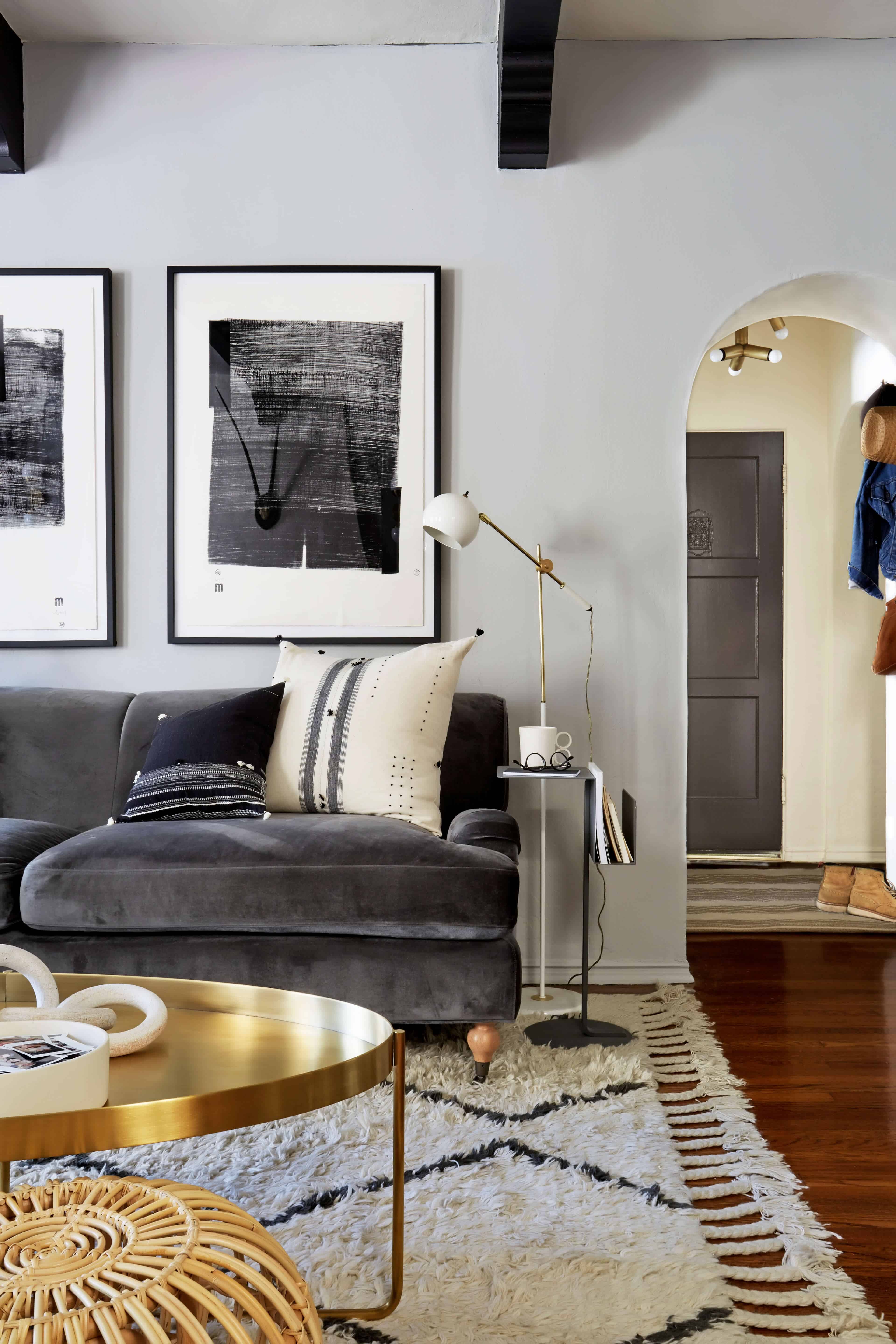 brady-tolbert-design_emily-henderson_living-room_eclectic_pavillion-grey_farrow-and-ball_brass-coffee-table_english-roll-arm_albini_masculine_traditional_west-elm_souk_flokati_leather_2