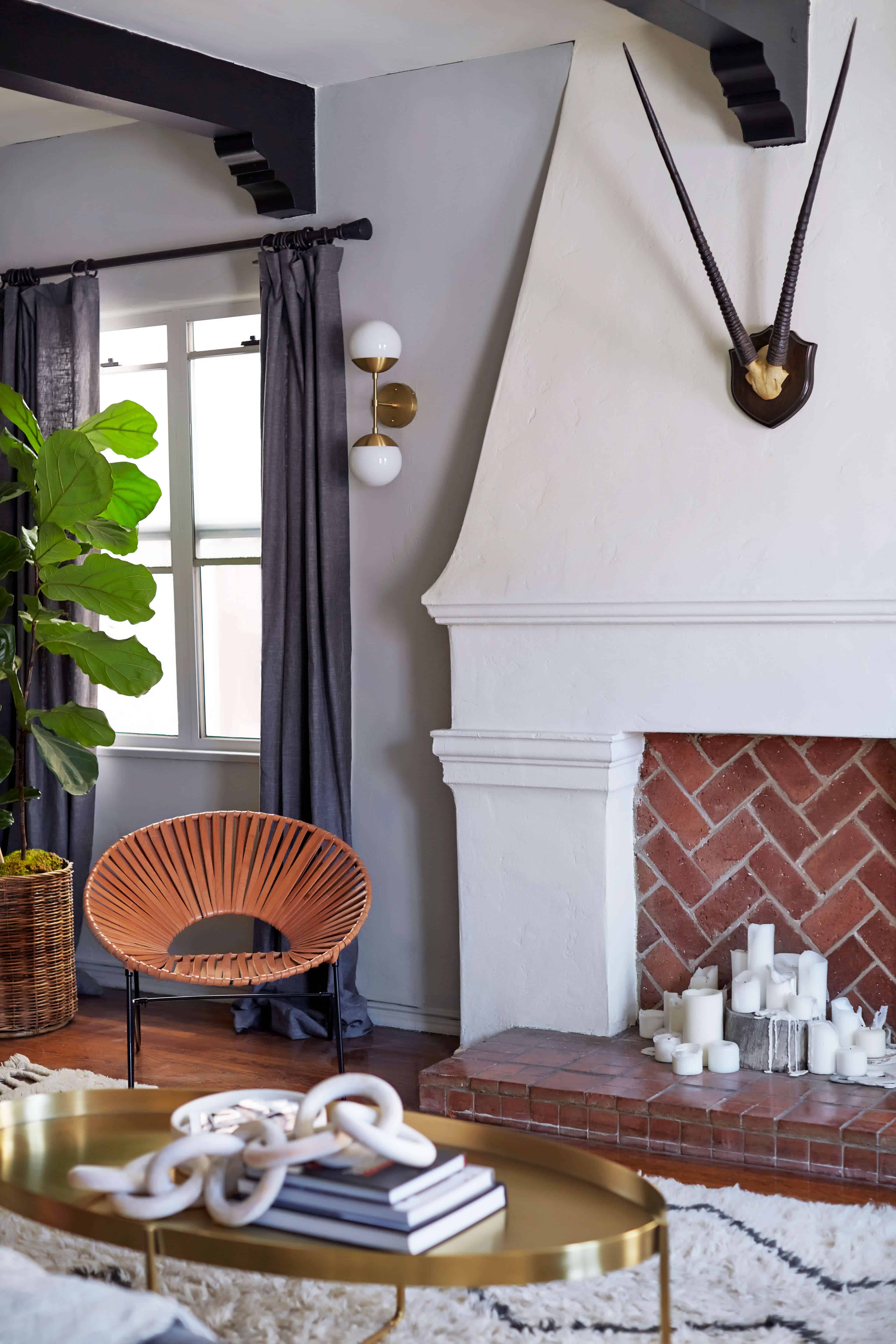 brady-tolbert-design_emily-henderson_living-room_eclectic_pavillion-grey_farrow-and-ball_brass-coffee-table_english-roll-arm_albini_masculine_traditional_west-elm_souk_flokati_leather_21