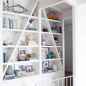 Emily-Henderson_Staged-to-Sell_Curbed_Simple_Uncluttered_Bookcase_Before_1