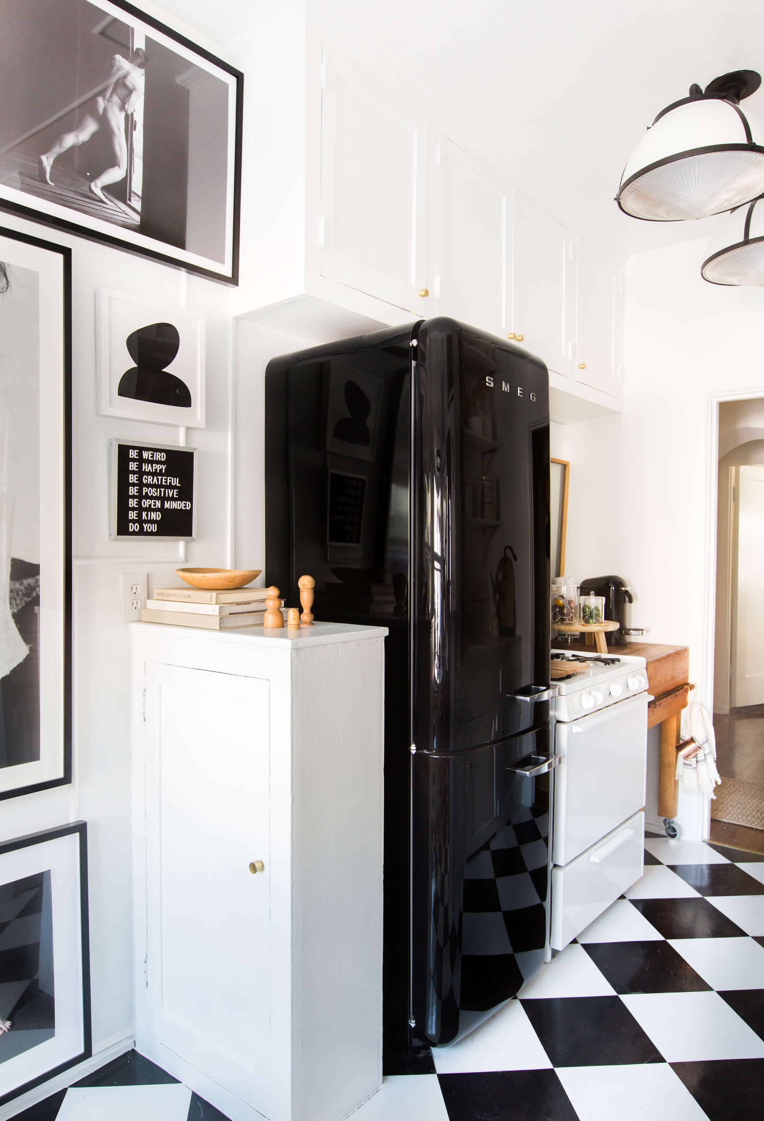 Brady-Tolbert_Emily-Henderson_Black-and-White-Kitchen_Vintage_Apartment-Refresh_Wood_Brass_Checkered-Floor_Copper-Pots_Eclectic_Glam_Modern_Traditional_23