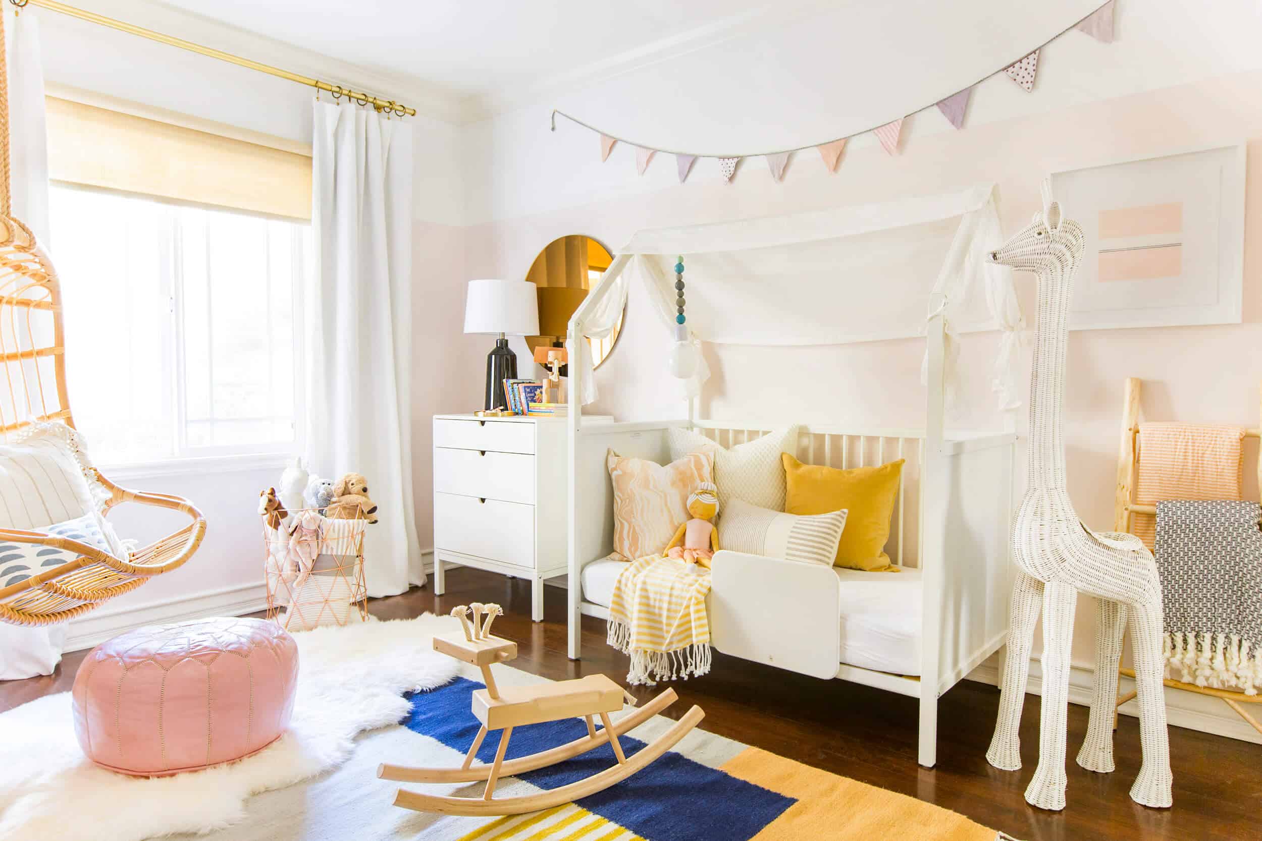 Emily Henderson Brady Tolbert Stokke Home Nursery Kids Room Pink Boho Scandinavian Modern White Pink Blush Room 8