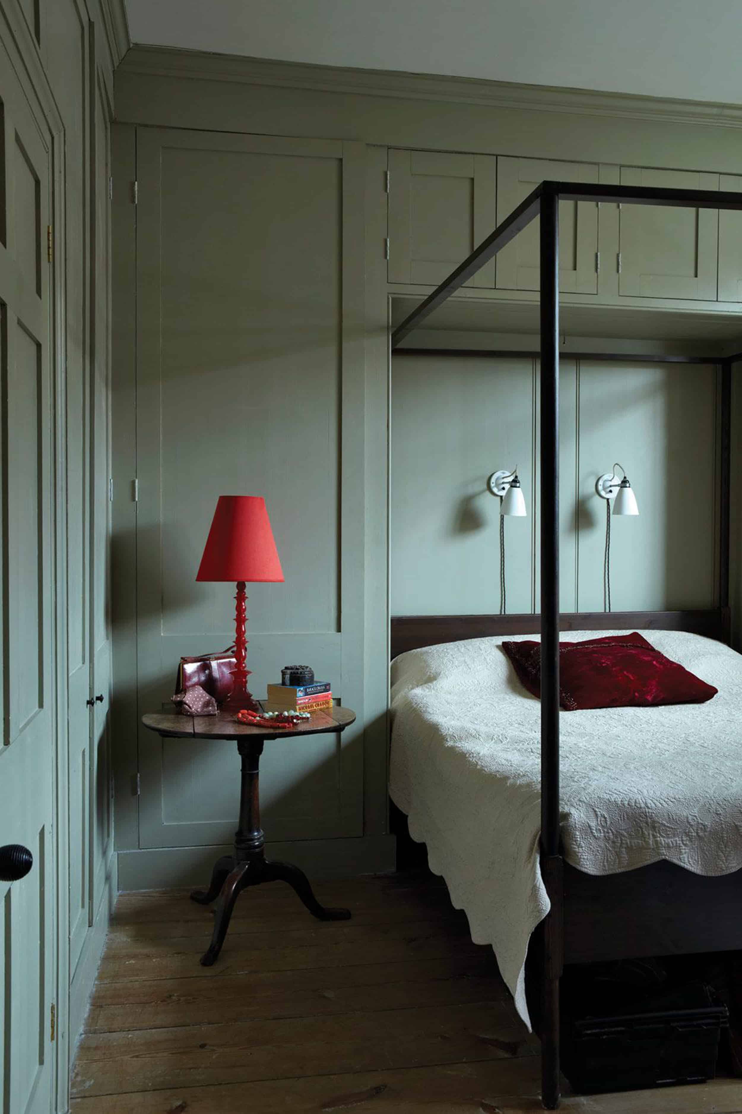 Modern Victorian Red Lamp green walls canopy bed