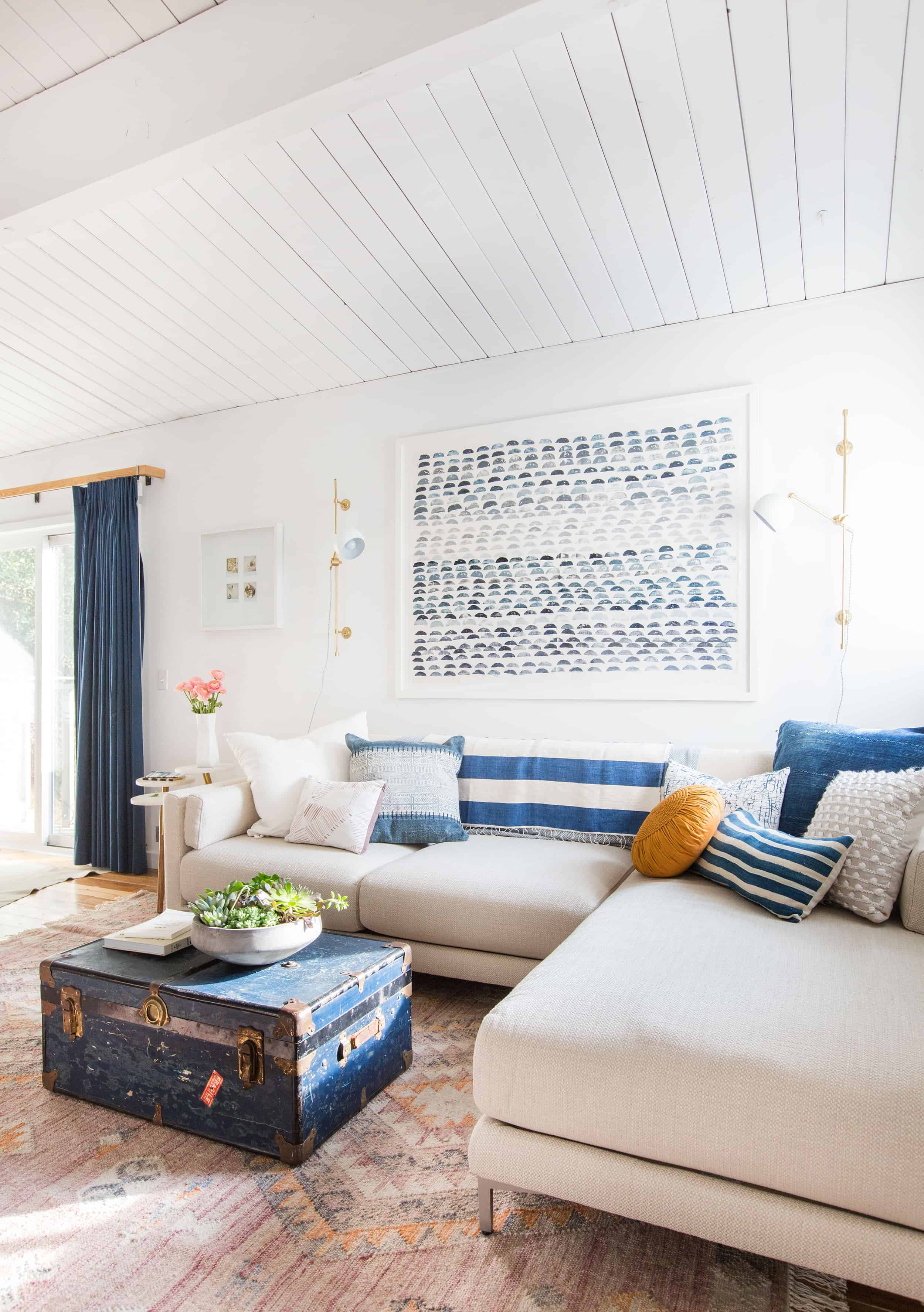 family room sectional sofa blue curtain sconces