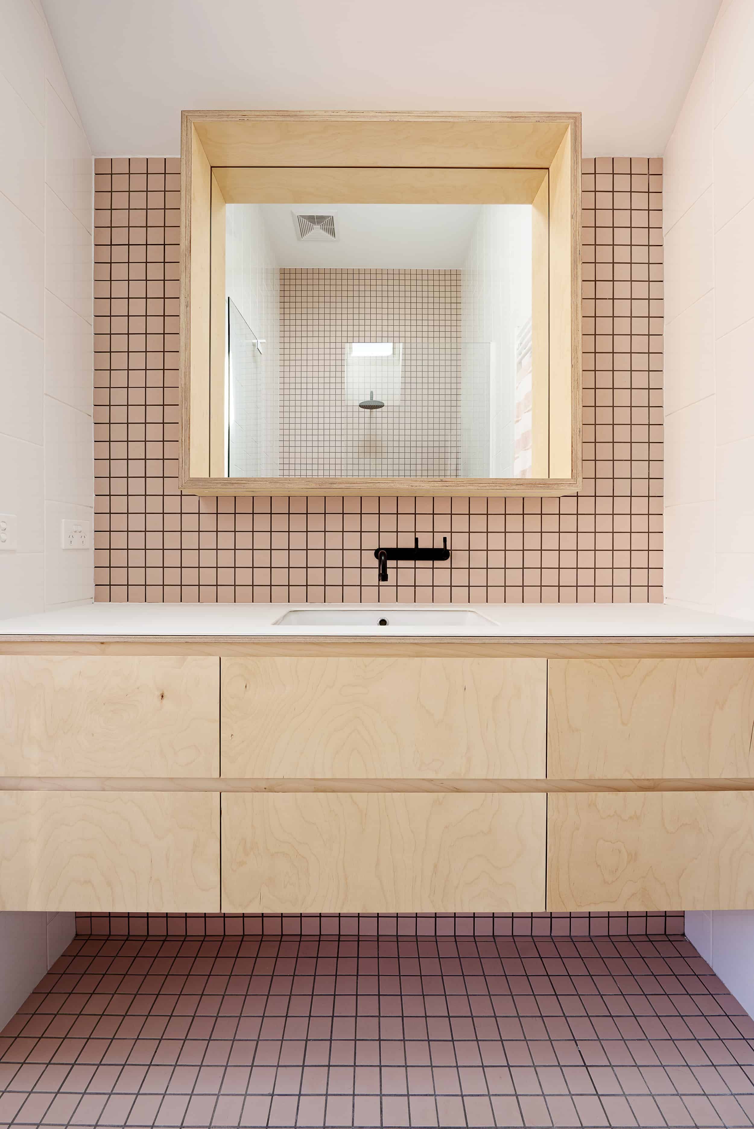 modern bathroom peach grid tile plywood vanity