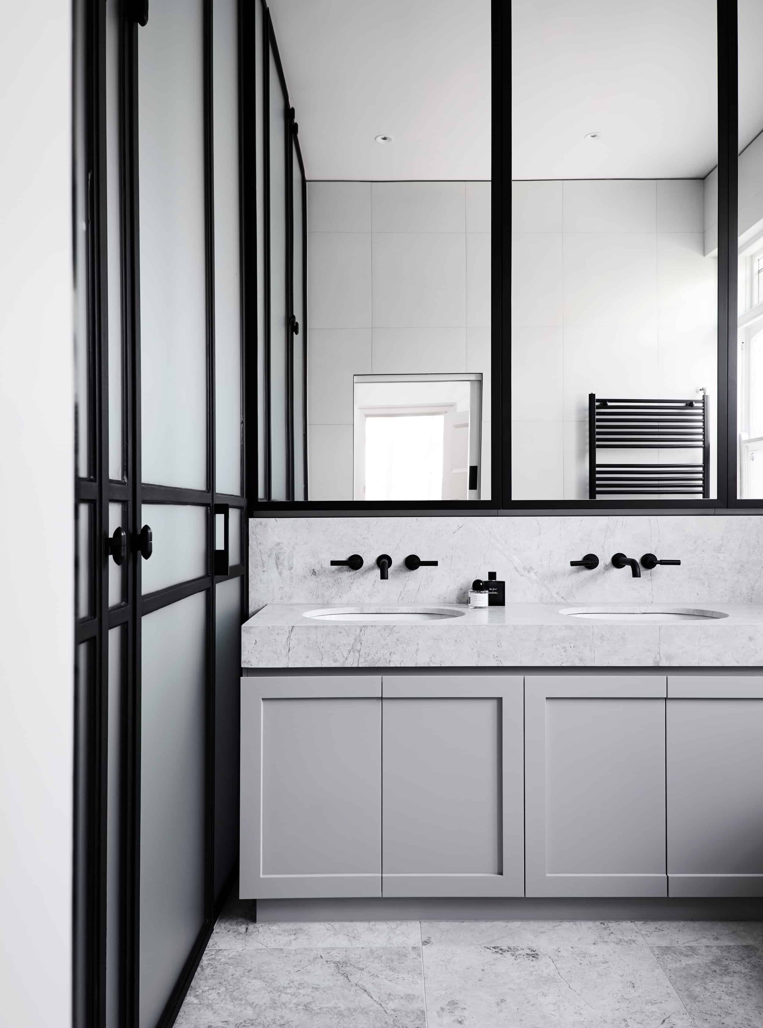 Black and white bathroom marble counter under mount sink