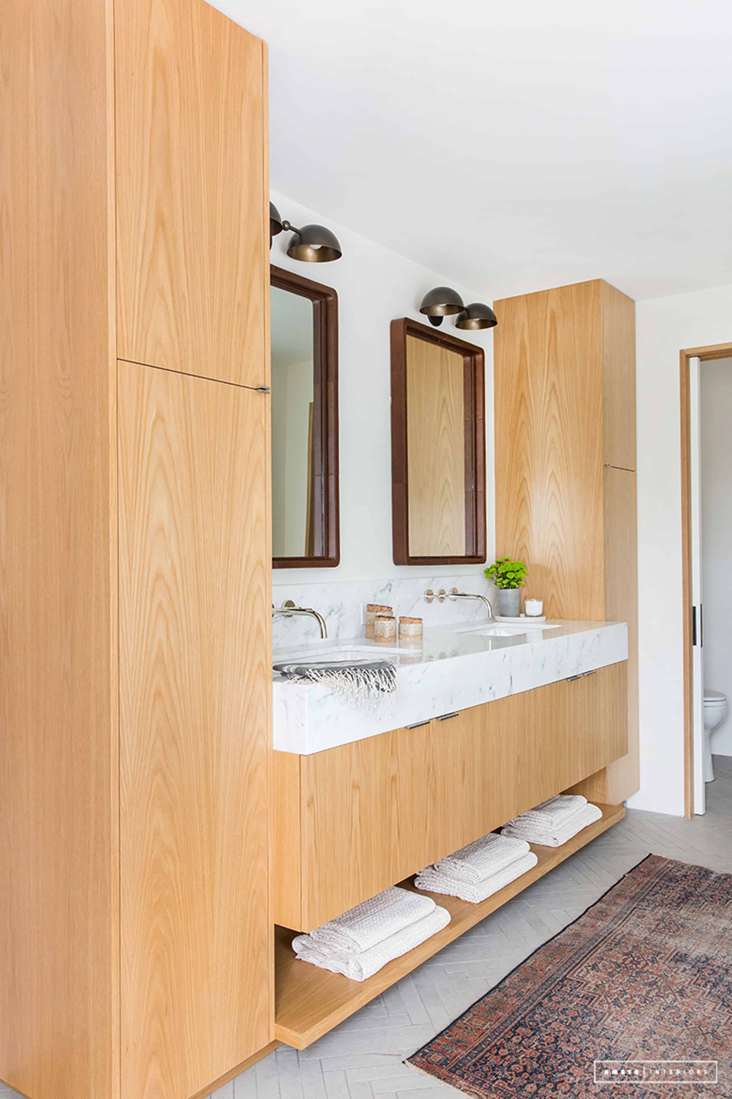 wood cabinets marble counter under mount sink