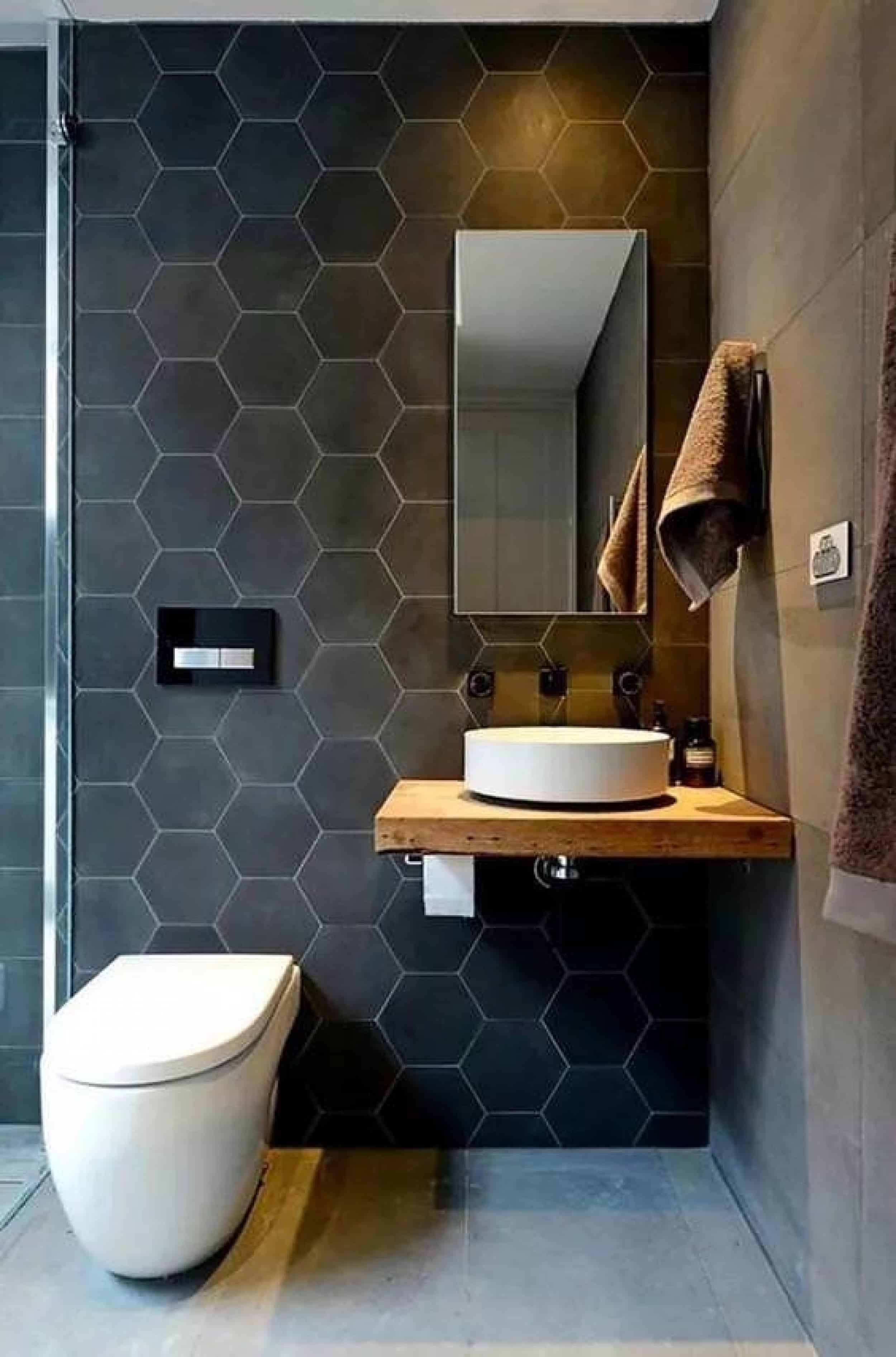 black wall hex tile vessel sink