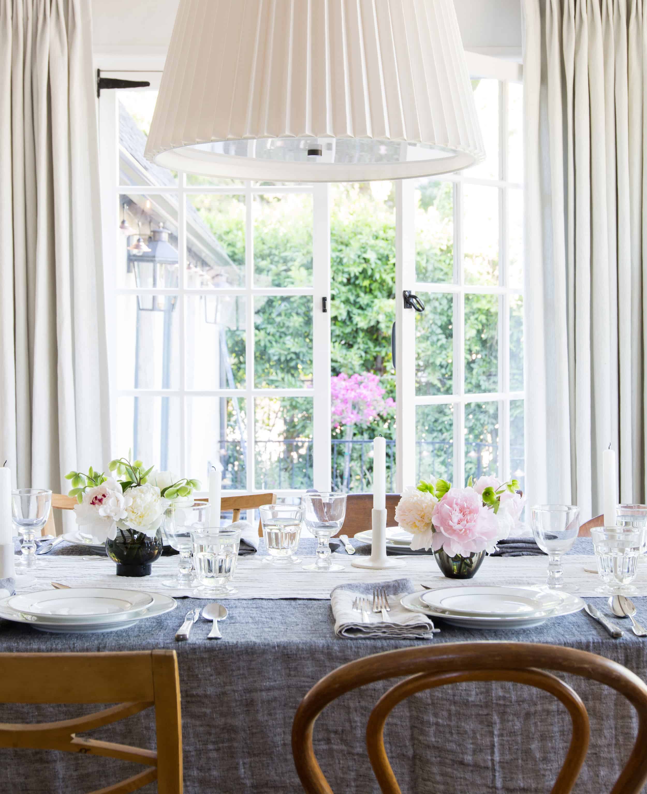 vintage chairs pendant light dining room tablescape table setting