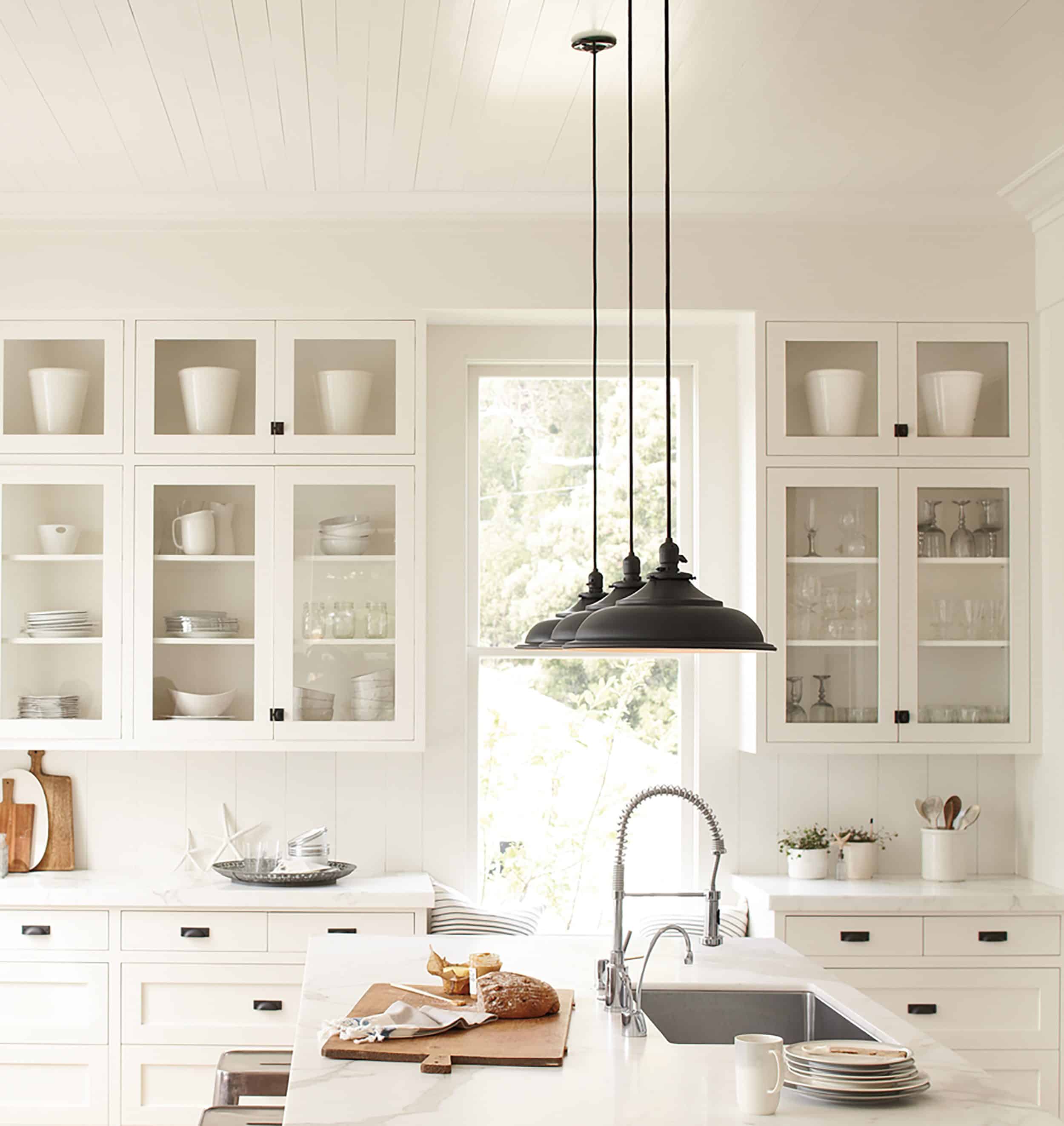 White Farmhouse Kitchen With Glass Cabinets