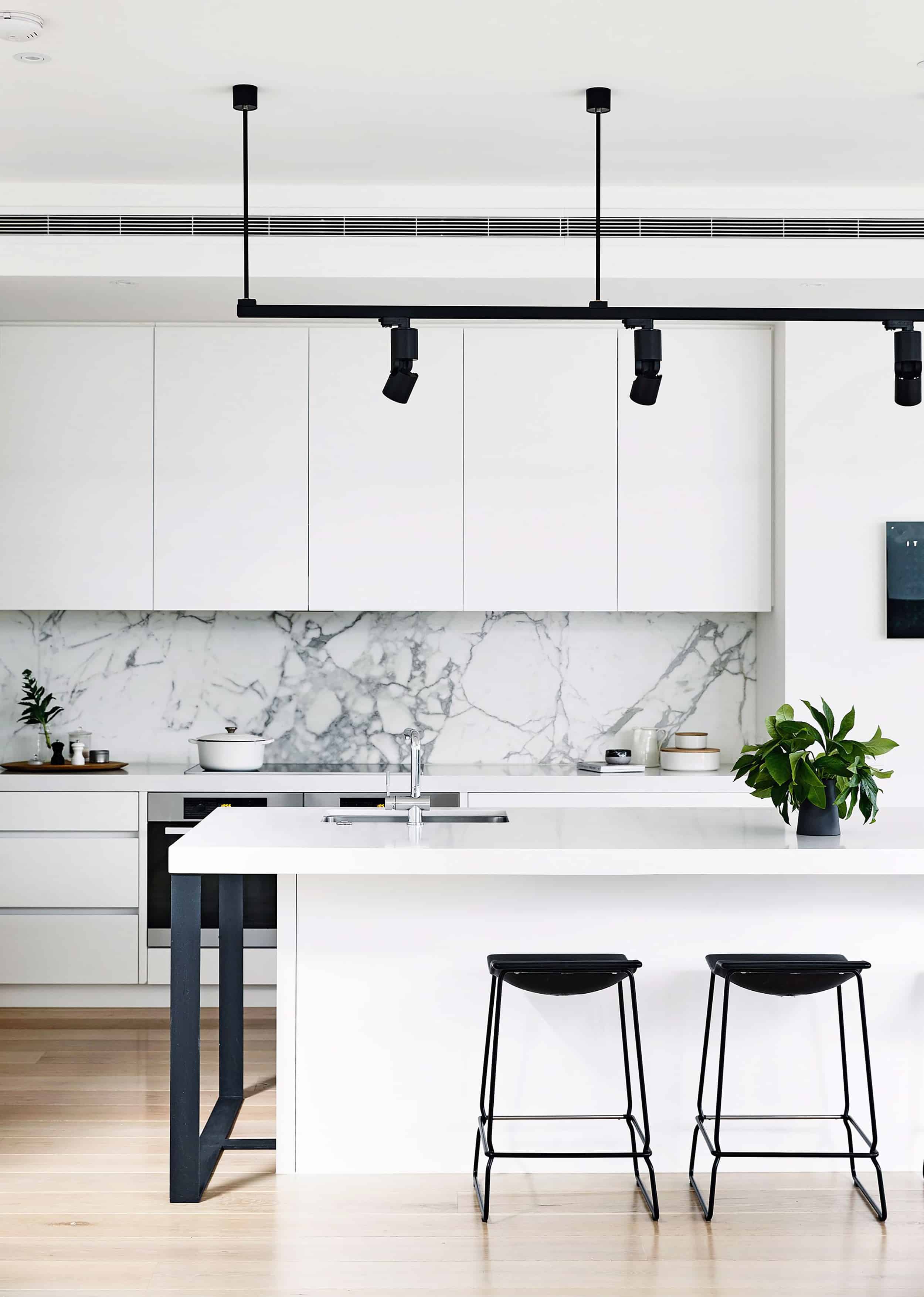 White marble kitchen modern track lighting