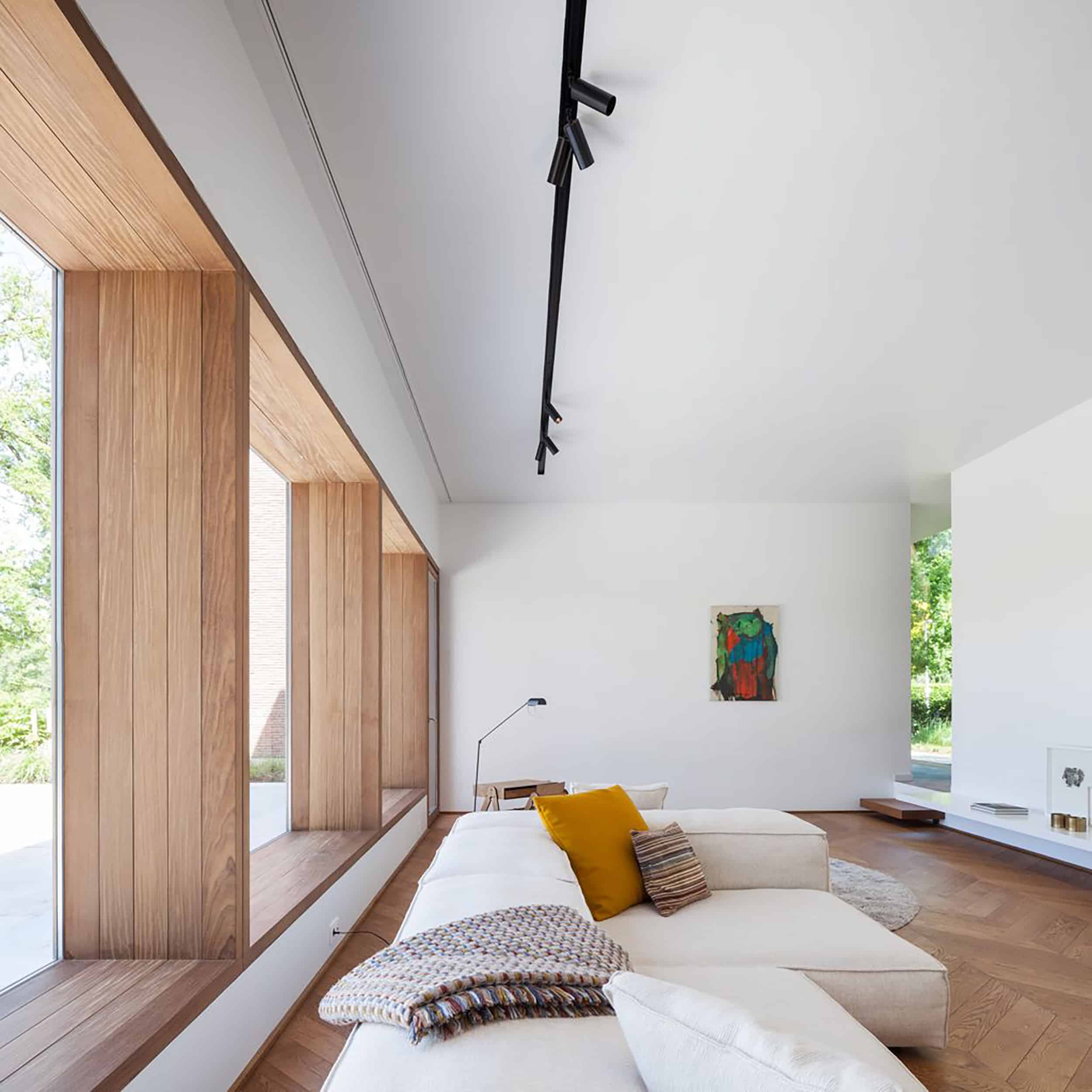 white sofa track lighting