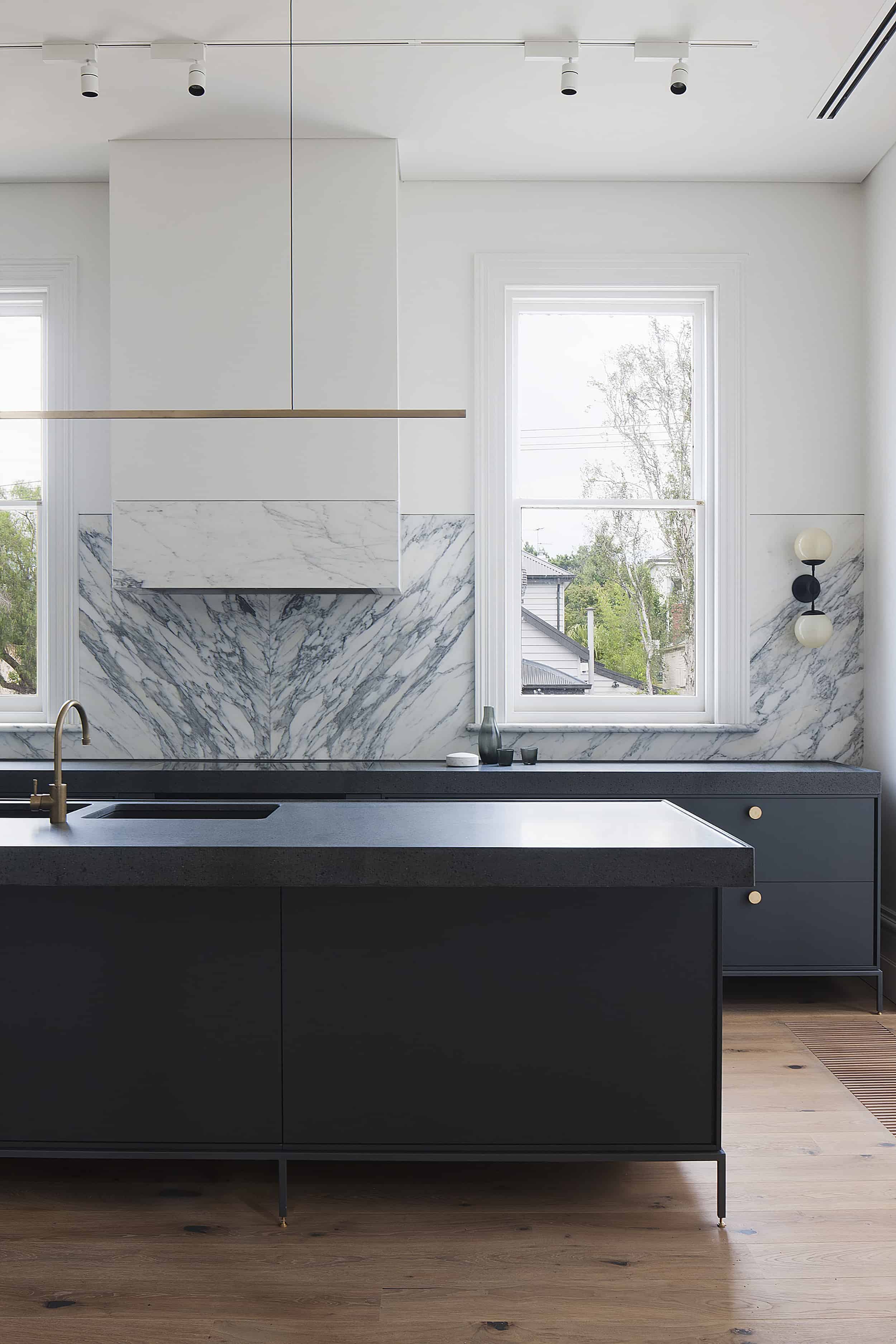 marble backsplash modern kitchen track lighting