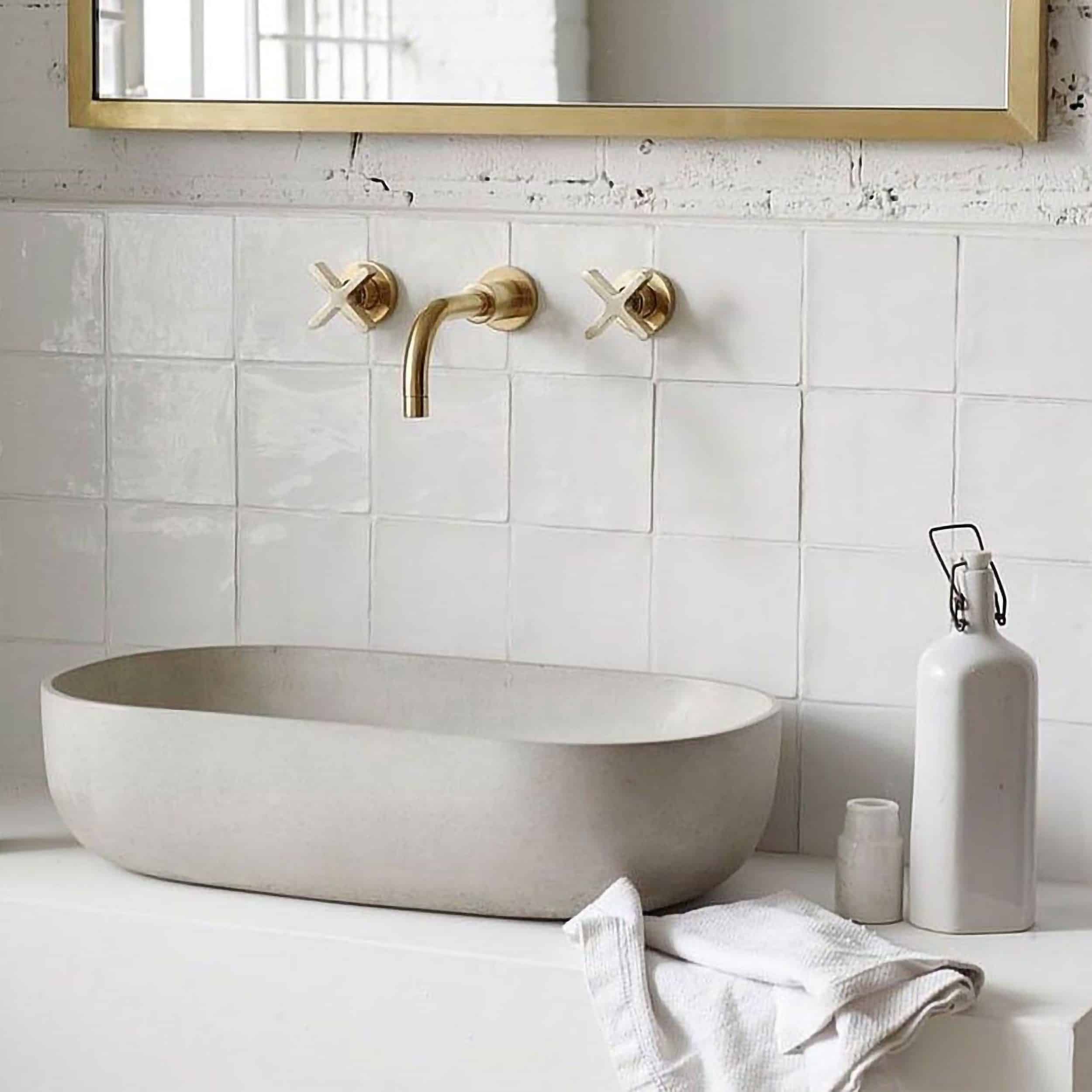 Top-Mount Bathroom Sink and Wall-Mount Gold Faucet