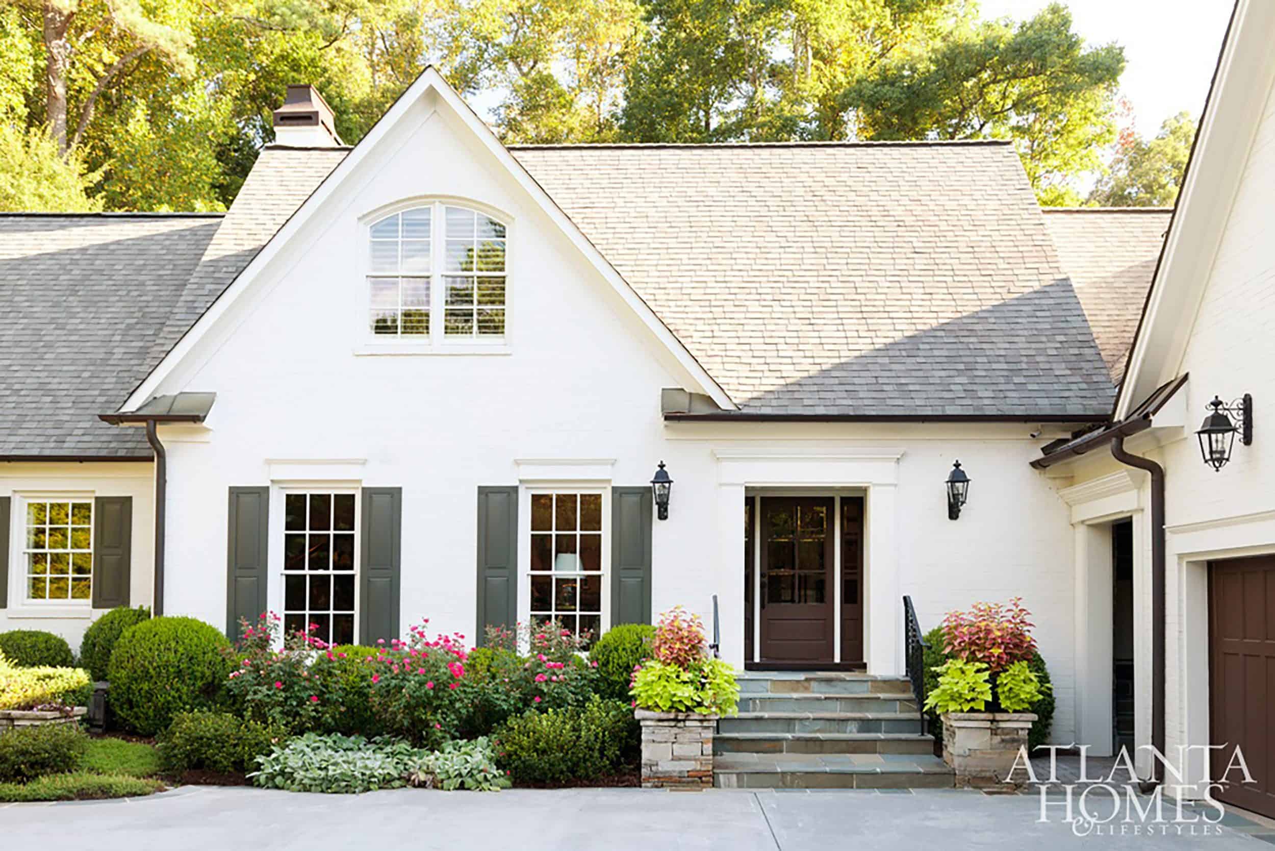 White House With Sage Shutters Wood Door
