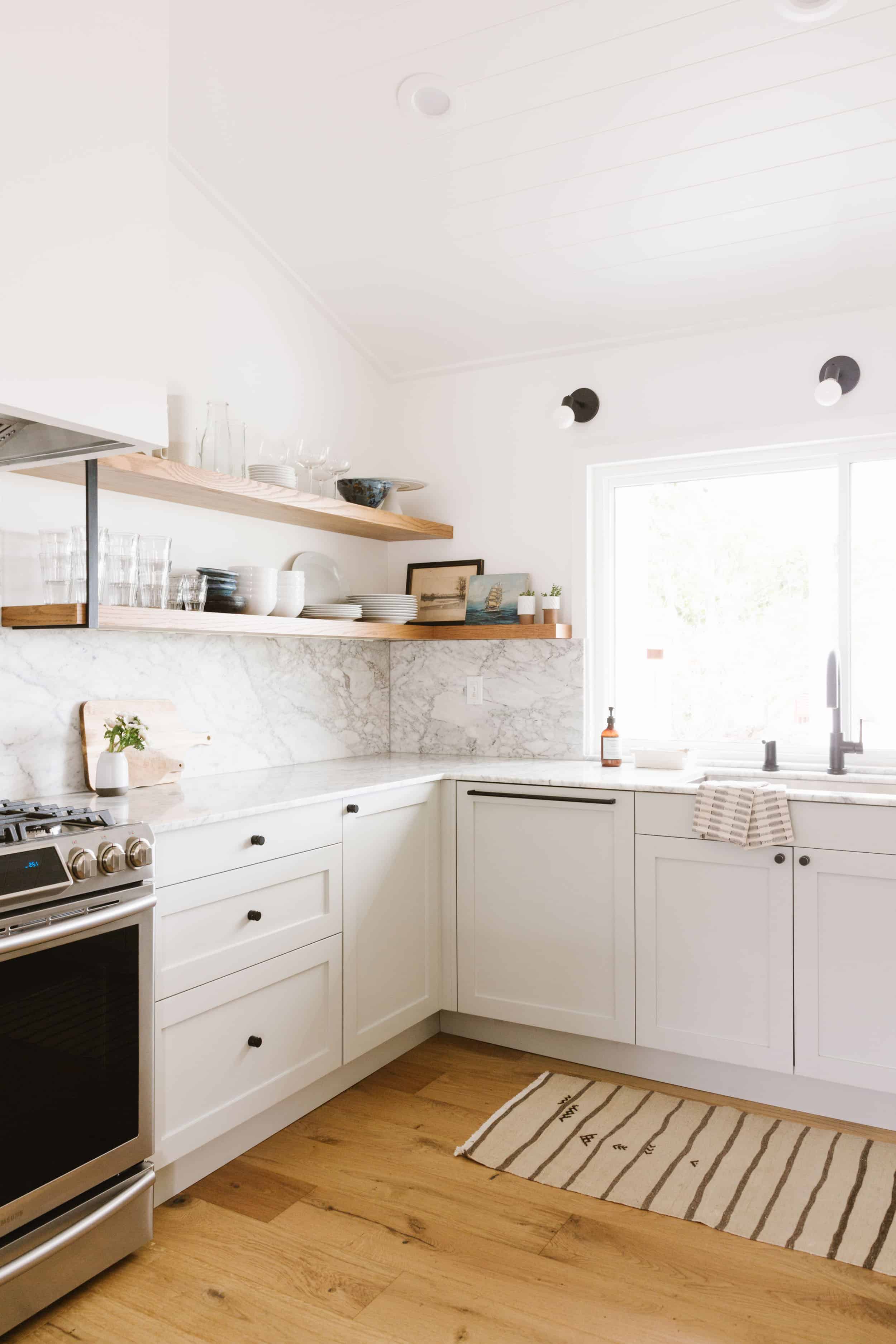 Samantha Gluck Emily Henderson Kitchen Marble Backsplash White Cabinets Scandi