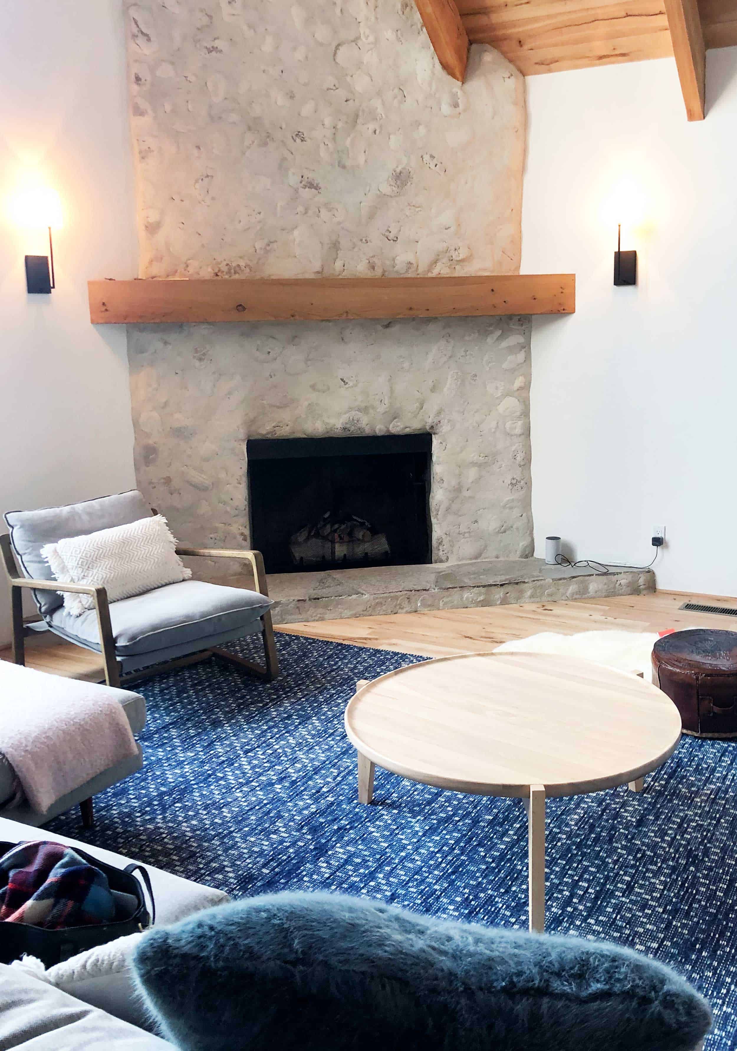 Emily Henderson Mountain House Living Room Rug Stone Fireplace