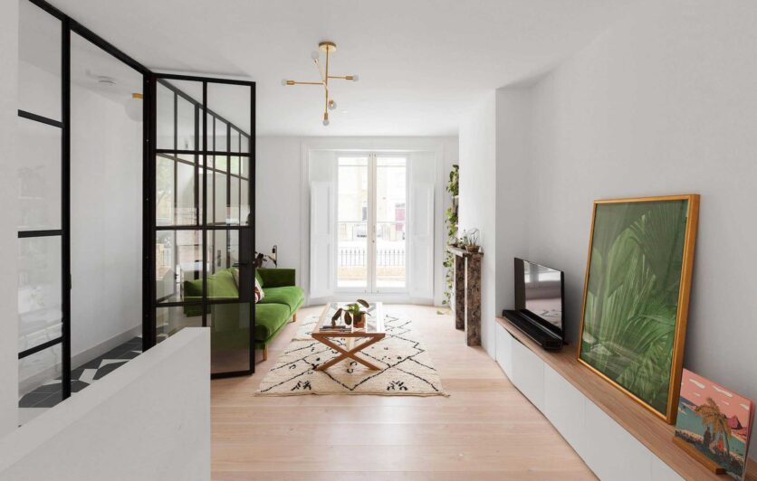 The Ground Floor Features Douglas Fir Flooring The Living Room At The Front Of The House Is Separated From The Entrance Hallway By Black Steel Framed Picture Windows