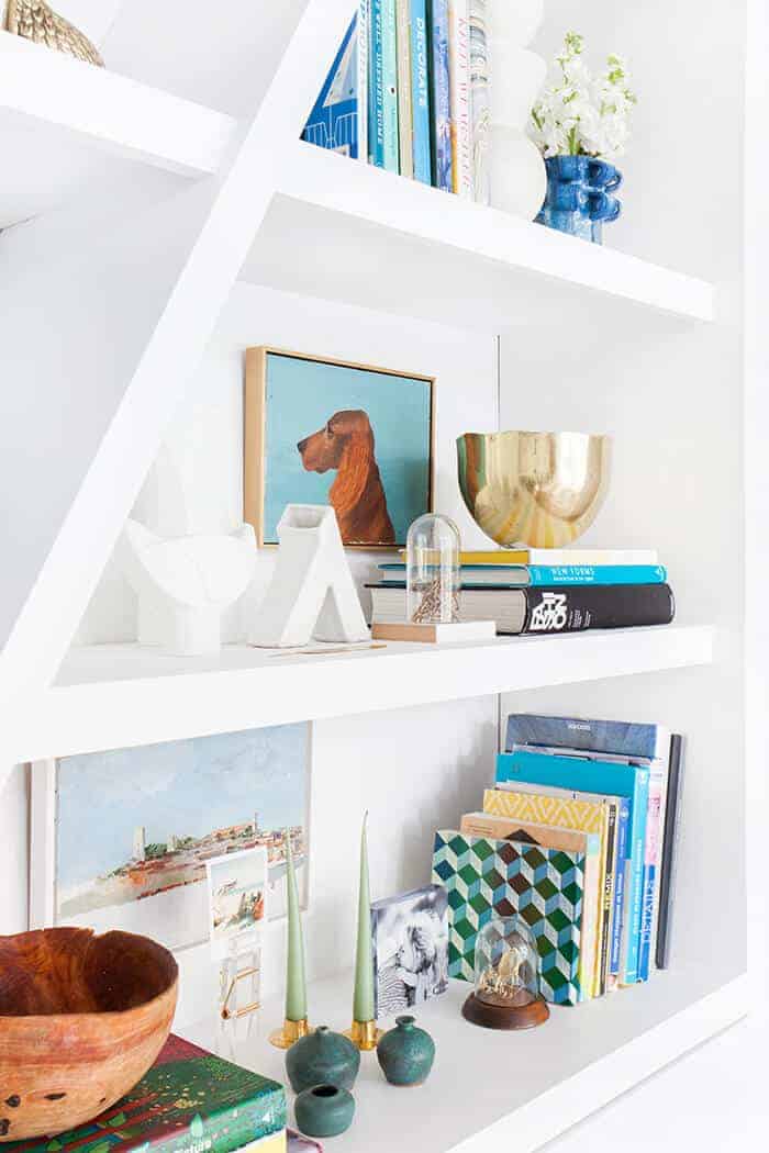 Emily Henderson Bookcase midcentury modern clean white accessories 1