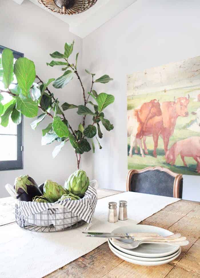 Emily Henderson_French Rustic Dining Room Crystal Chandelier Concrete Tile California Casual_overall dining table