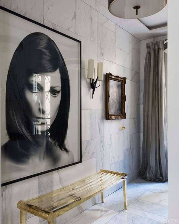gold bench under art